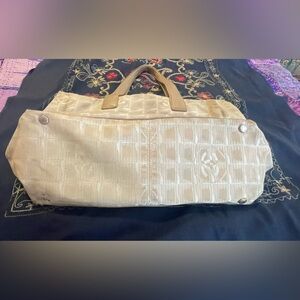 Chanel Travel Line Elegant Cream Tote. GUC! Apx 10 x 16 x 6“.